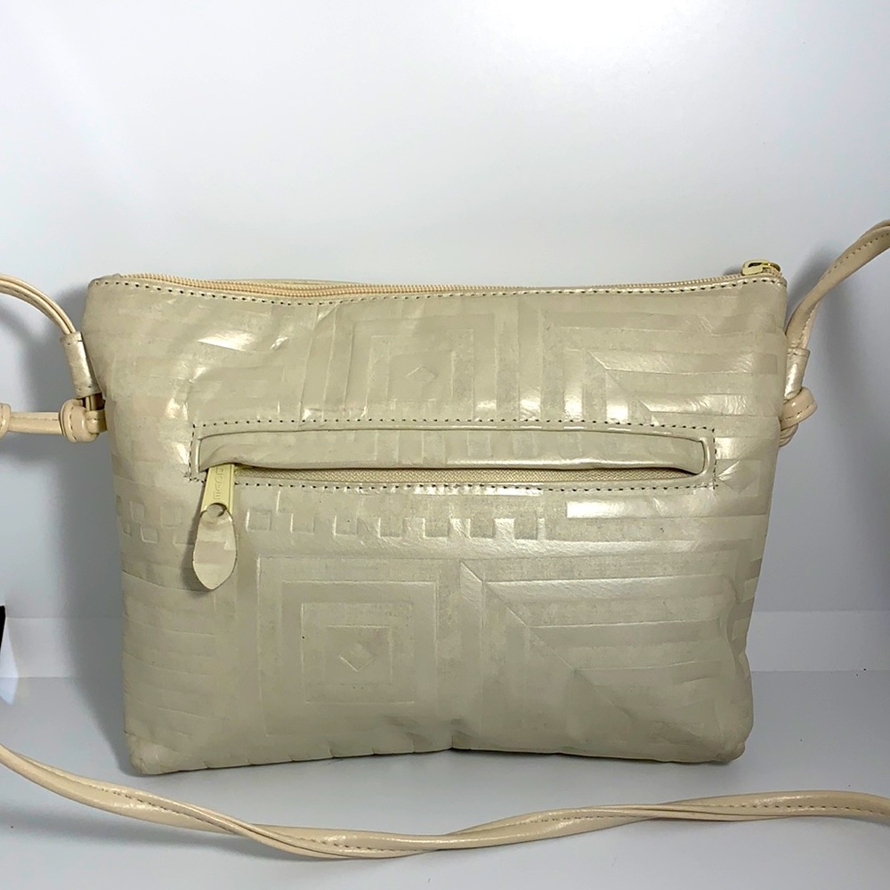 “Pinky” crossbody in Cream pearl and suede.